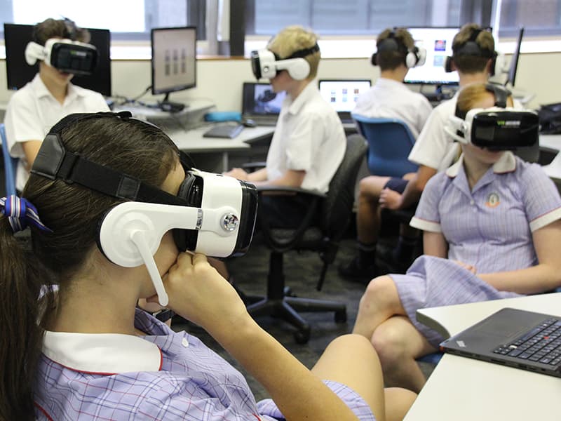 A number of students experiencing virtual reality at school